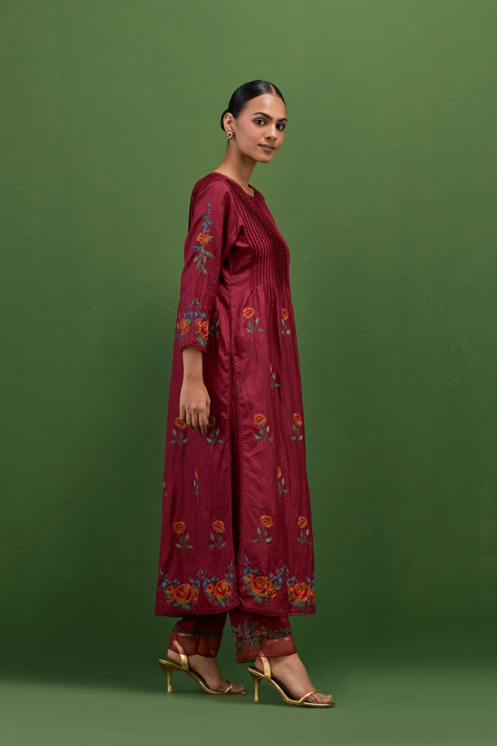 Rosewood silk kurta set with pin tucks at yoke and all-over rose flower embroidery.