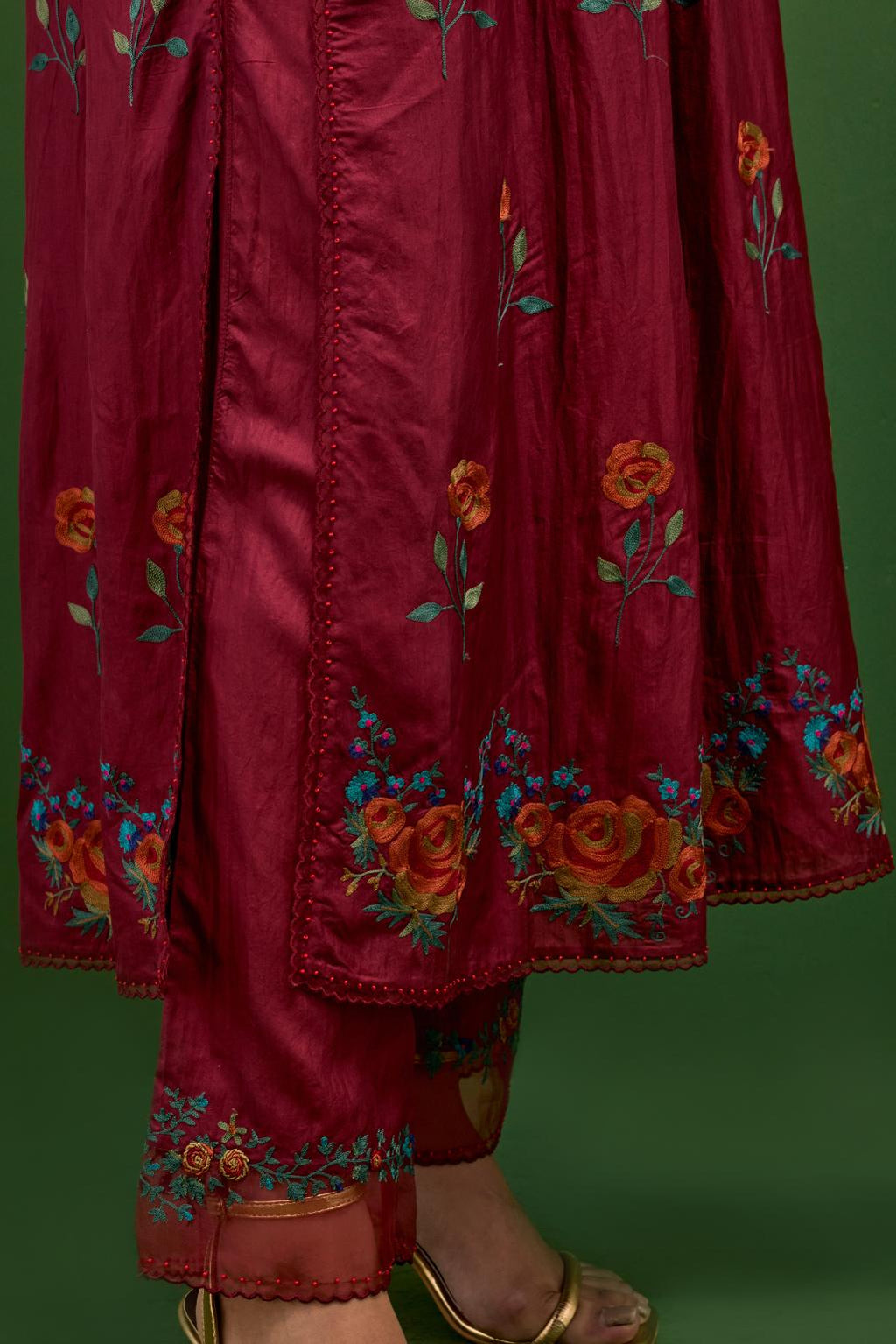 Rosewood silk kurta set with pin tucks at yoke and all-over rose flower embroidery.