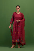 Rosewood silk kurta set with pin tucks at yoke and all-over rose flower embroidery.