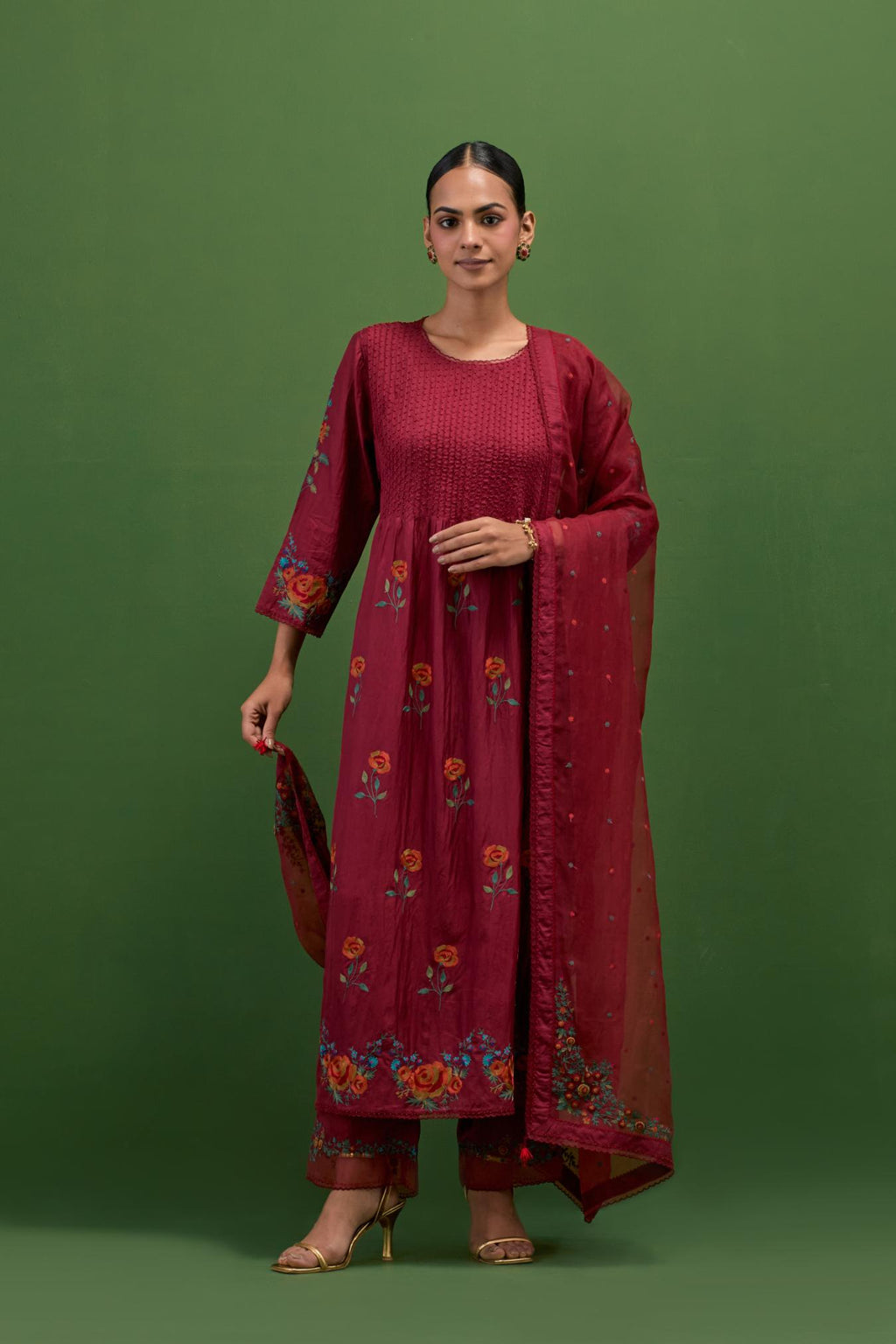 Rosewood silk kurta set with pin tucks at yoke and all-over rose flower embroidery.