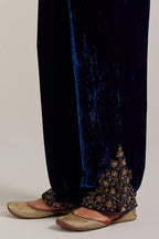 Navy blue Silk velvet pants, highlighted with hand embroidered bead, sequins, zardozi and zari boota at bottom hem.