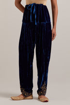 Navy blue Silk velvet salwar, highlighted with hand embroidered bead, sequins, zardozi and zari boota at bottom hem.