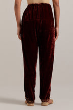 Burnt umber Silk velvet salwar, highlighted with hand embroidered bead, sequins, zardozi and zari boota at bottom hem.