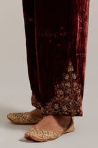 Burnt umber Silk velvet pants, highlighted with hand embroidered bead, sequins, zardozi and zari boota at bottom hem.