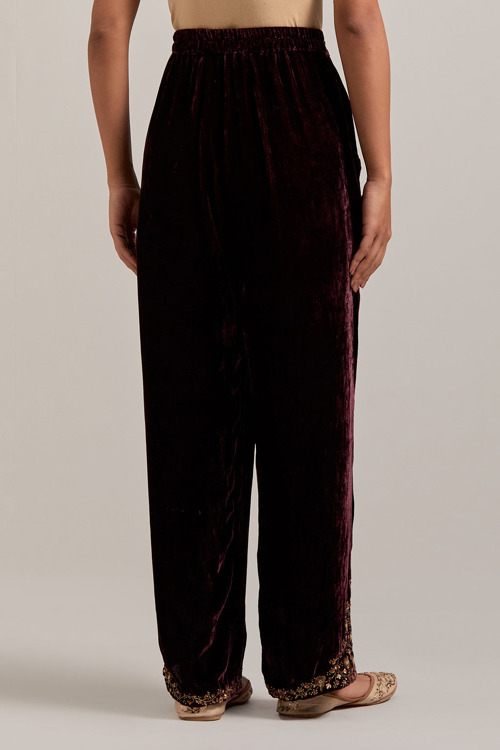 Rich Brown Silk velvet pants, highlighted with hand embroidered bead, sequins, zardozi and zari boota at bottom hem.