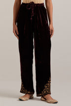 Rich Brown Silk velvet pants, highlighted with hand embroidered bead, sequins, zardozi and zari boota at bottom hem.