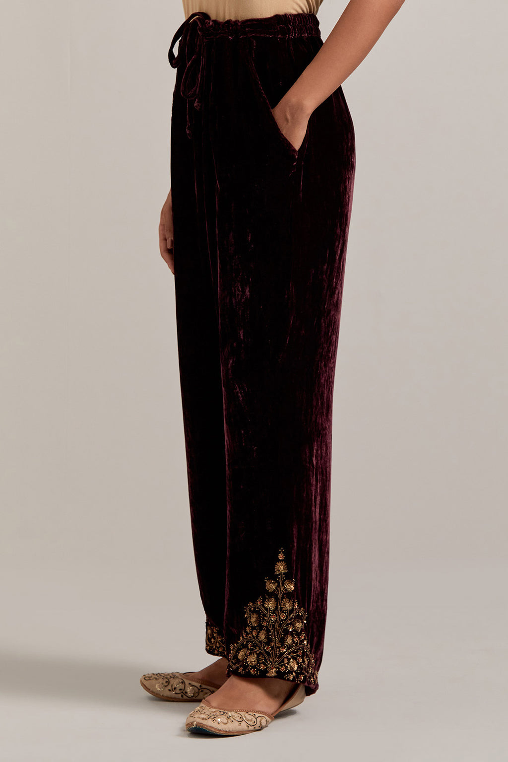 Rich Brown Silk velvet pants, highlighted with hand embroidered bead, sequins, zardozi and zari boota at bottom hem.