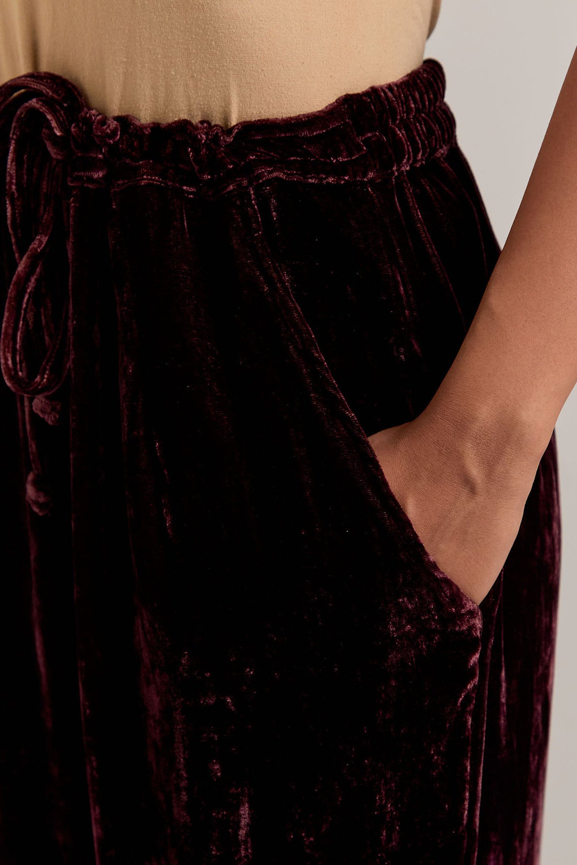Rich Brown Silk velvet pants, highlighted with hand embroidered bead, sequins, zardozi and zari boota at bottom hem.