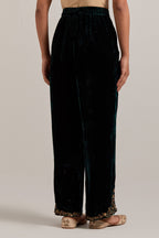 Dark green Silk velvet pants, highlighted with hand embroidered bead, sequins, zardozi and zari boota at bottom hem.