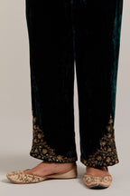 Dark green Silk velvet pants, highlighted with hand embroidered bead, sequins, zardozi and zari boota at bottom hem.