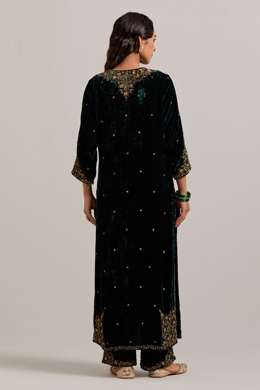 Dark green straight Silk Velvet kurta set with all-over hand-embroidered bead, sequins, zardozi and zari work.