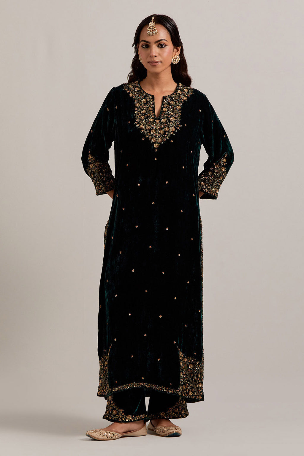 Dark green straight Silk Velvet kurta set with all-over hand-embroidered bead, sequins, zardozi and zari work.