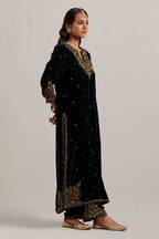 Dark green straight Silk Velvet kurta set with all-over hand-embroidered bead, sequins, zardozi and zari work.