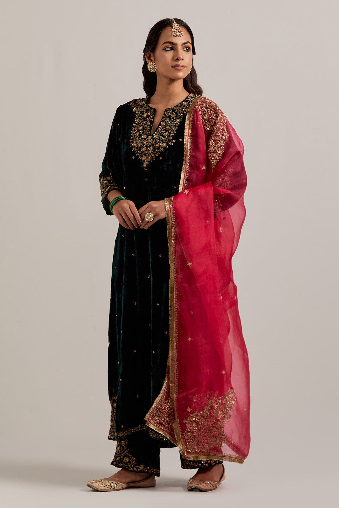 Dark green straight Silk Velvet kurta set with all-over hand-embroidered bead, sequins, zardozi and zari work.