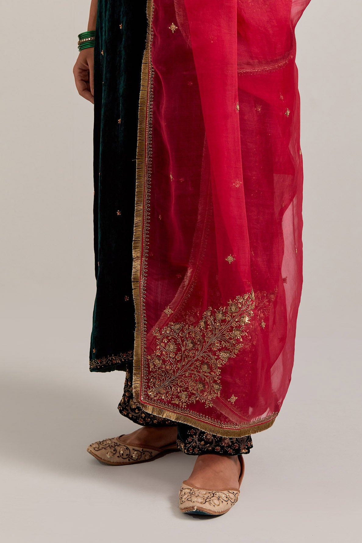 Dark green straight Silk Velvet kurta set with all-over hand-embroidered bead, sequins, zardozi and zari work.