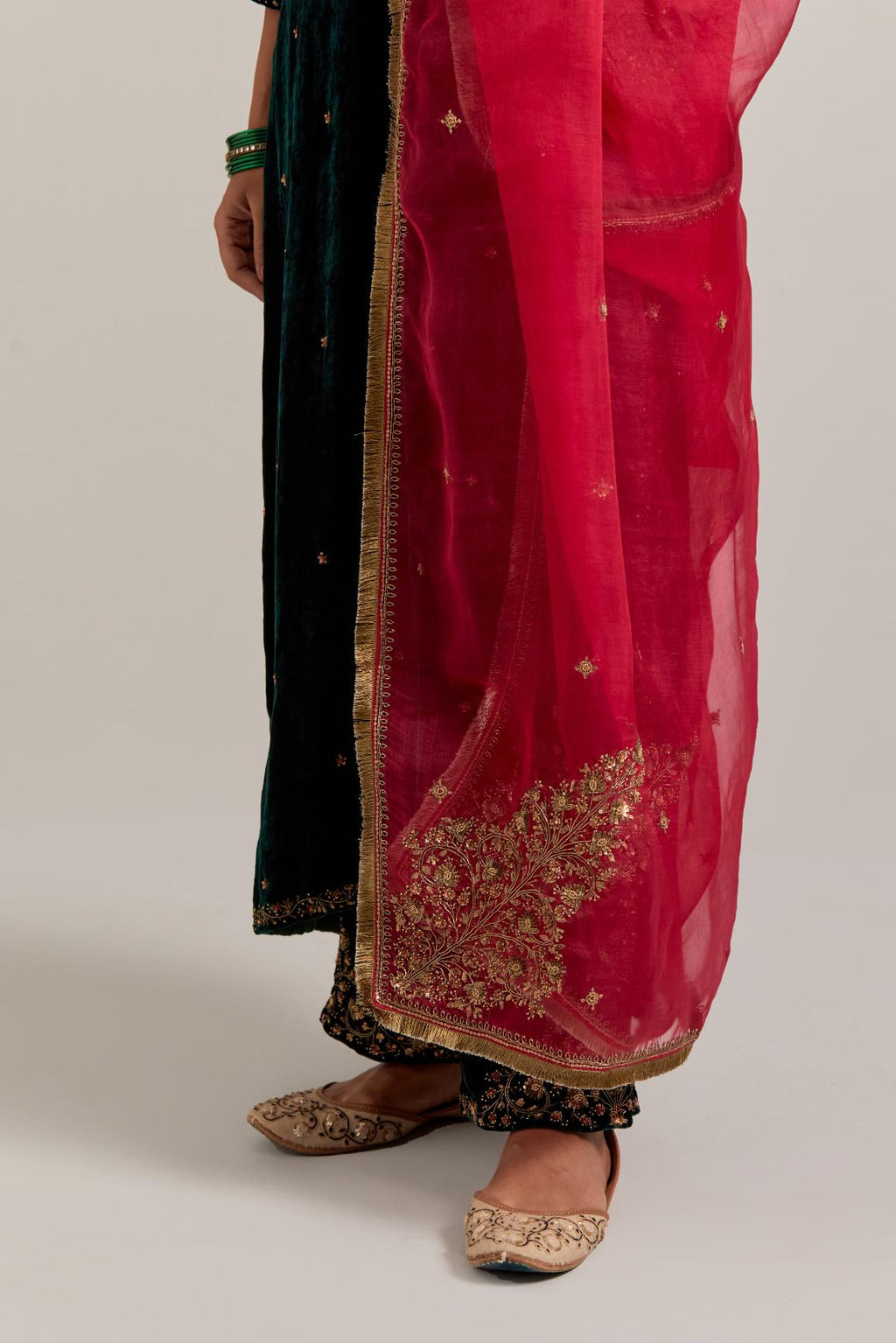 Fuchsia silk organza dupatta with delicate sequins, zardozi and zari work, highlighted with contrast bead work.