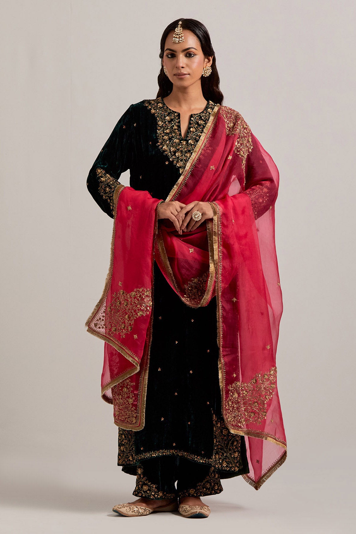 Dark green straight Silk Velvet kurta set with all-over hand-embroidered bead, sequins, zardozi and zari work.