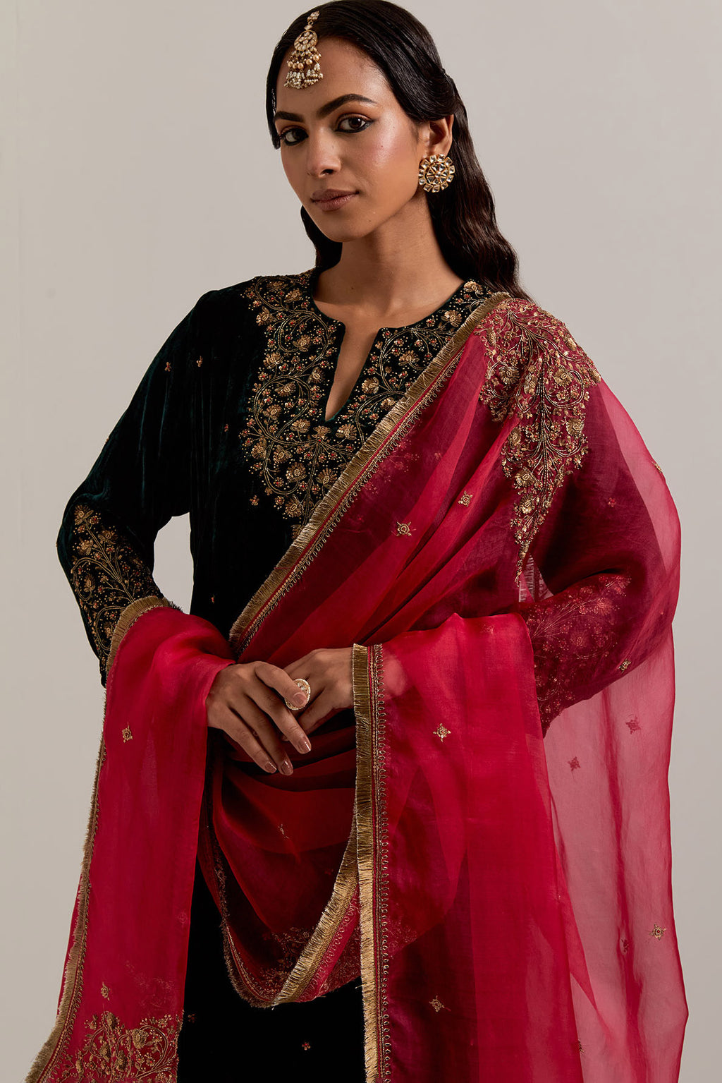 Dark green straight Silk Velvet kurta set with all-over hand-embroidered bead, sequins, zardozi and zari work.
