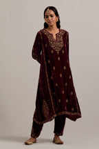 Plum easy fit A-line, panelled, short kurta set in silk velvet with all-over hand embroidery at the neck, sleeves and hem.