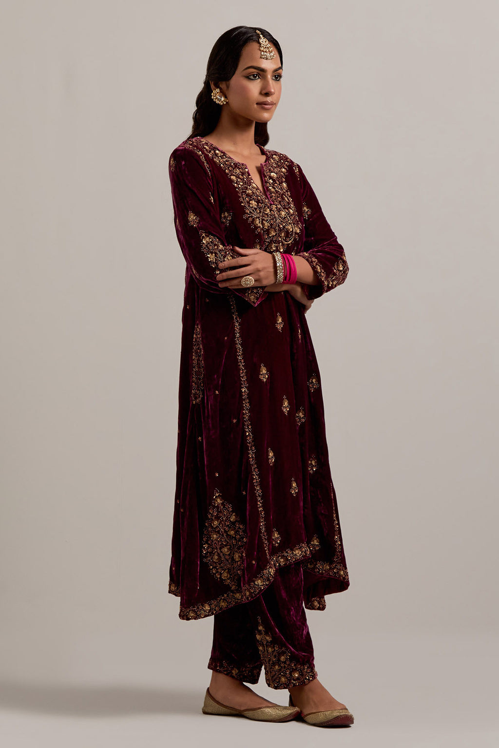 Plum easy fit A-line, panelled, short kurta set in silk velvet with all-over hand embroidery at the neck, sleeves and hem.