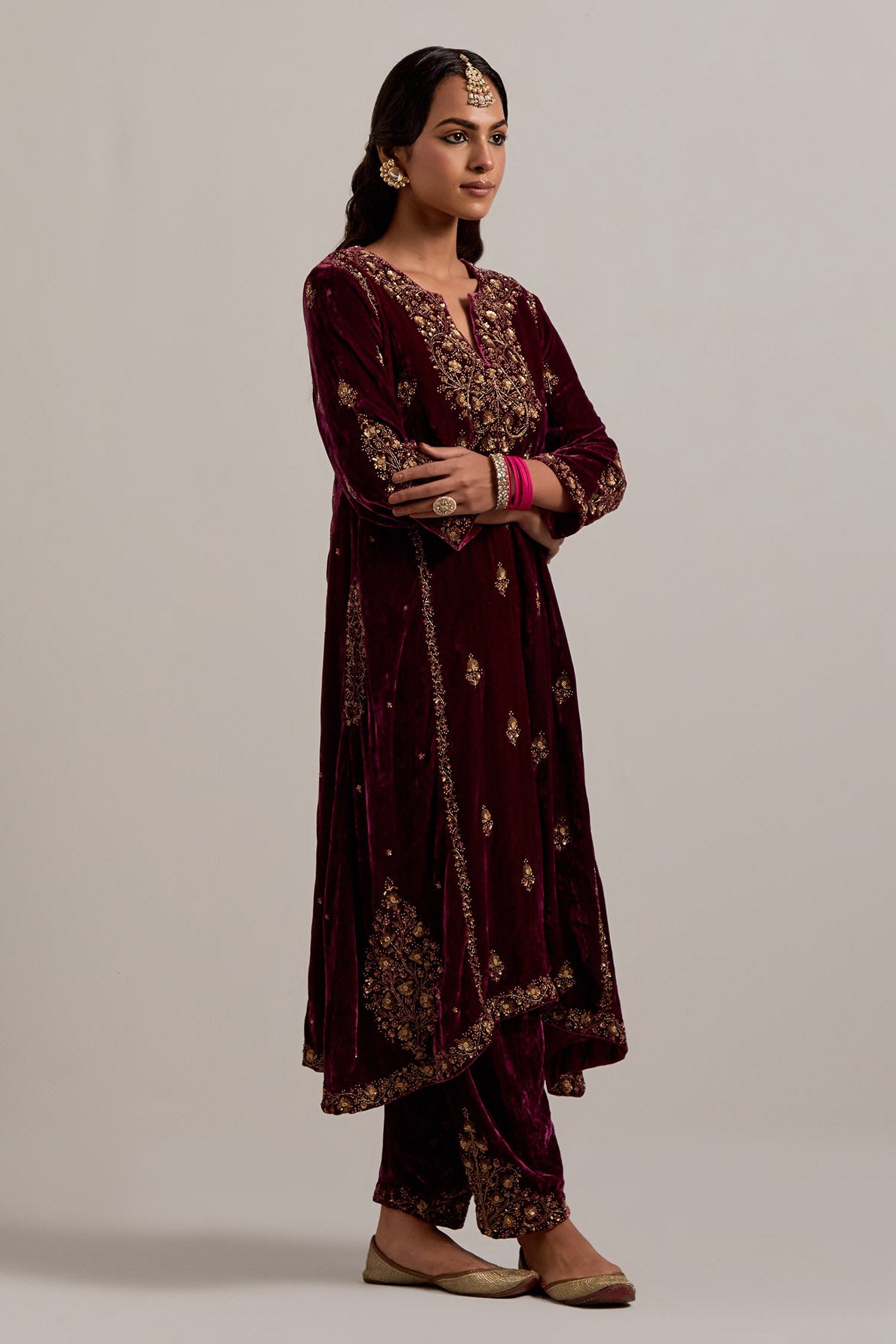 Plum easy fit A-line, panelled, short kurta set in silk velvet with all-over hand embroidery at the neck, sleeves and hem.