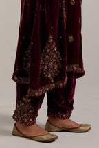 Plum easy fit A-line, panelled, short kurta set in silk velvet with all-over hand embroidery at the neck, sleeves and hem.