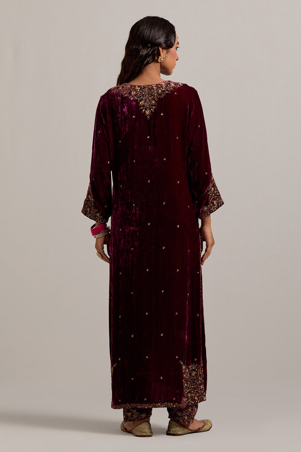 Plum straight Silk Velvet kurta set with all-over hand-embroidered bead, sequins, zardozi and zari work.