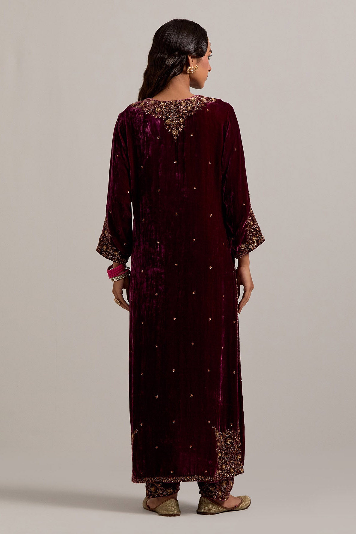 Plum straight Silk Velvet kurta set with all-over hand-embroidered bead, sequins, zardozi and zari work.