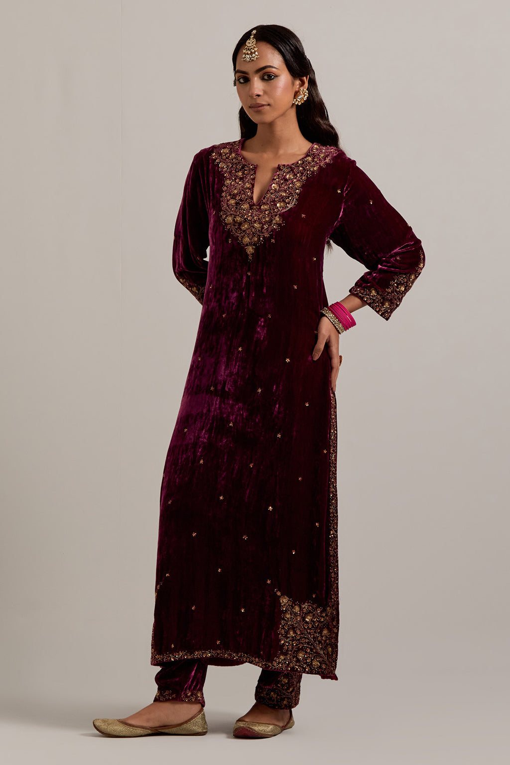 Plum straight Silk Velvet kurta set with all-over hand-embroidered bead, sequins, zardozi and zari work.