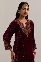 Plum straight Silk Velvet kurta set with all-over hand-embroidered bead, sequins, zardozi and zari work.