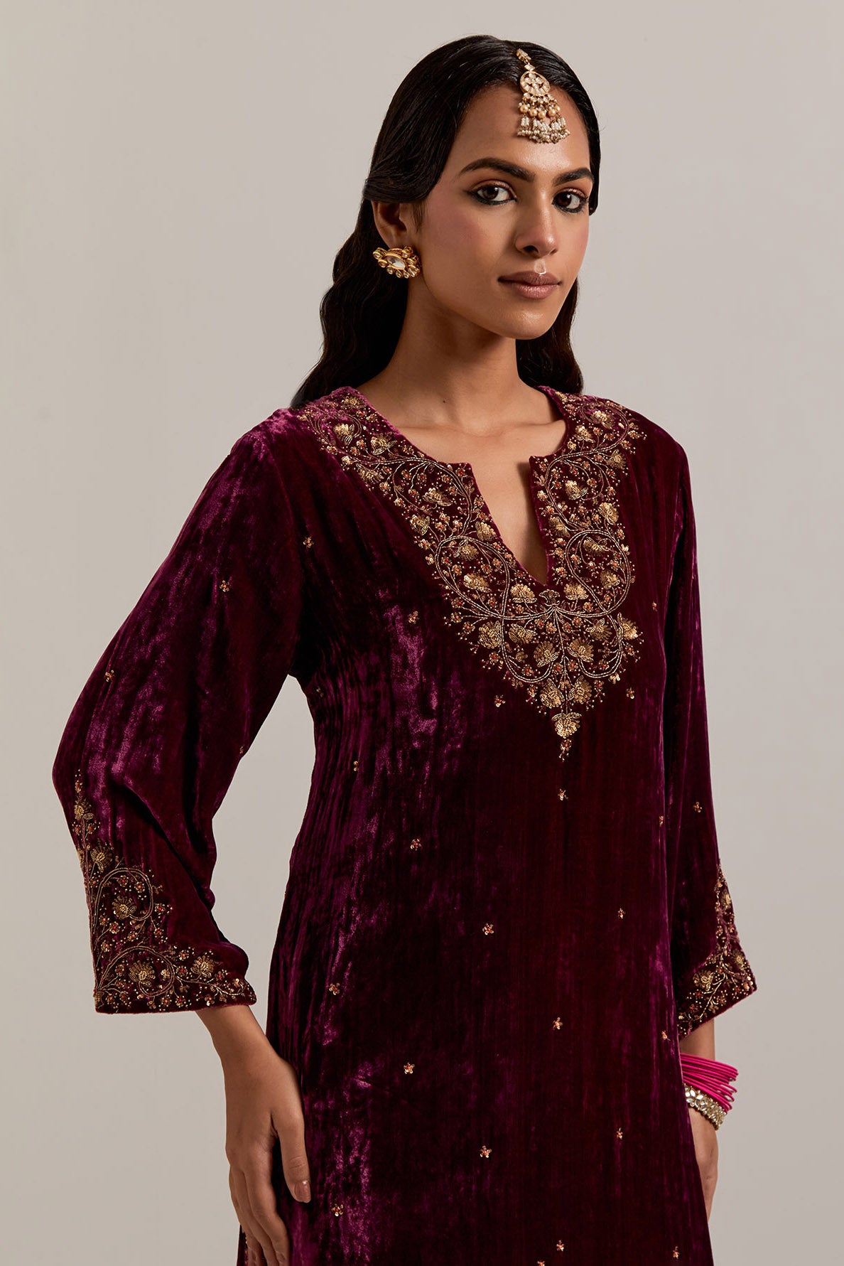 Plum straight Silk Velvet kurta set with all-over hand-embroidered bead, sequins, zardozi and zari work.