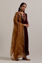 Plum straight Silk Velvet kurta set with all-over hand-embroidered bead, sequins, zardozi and zari work.