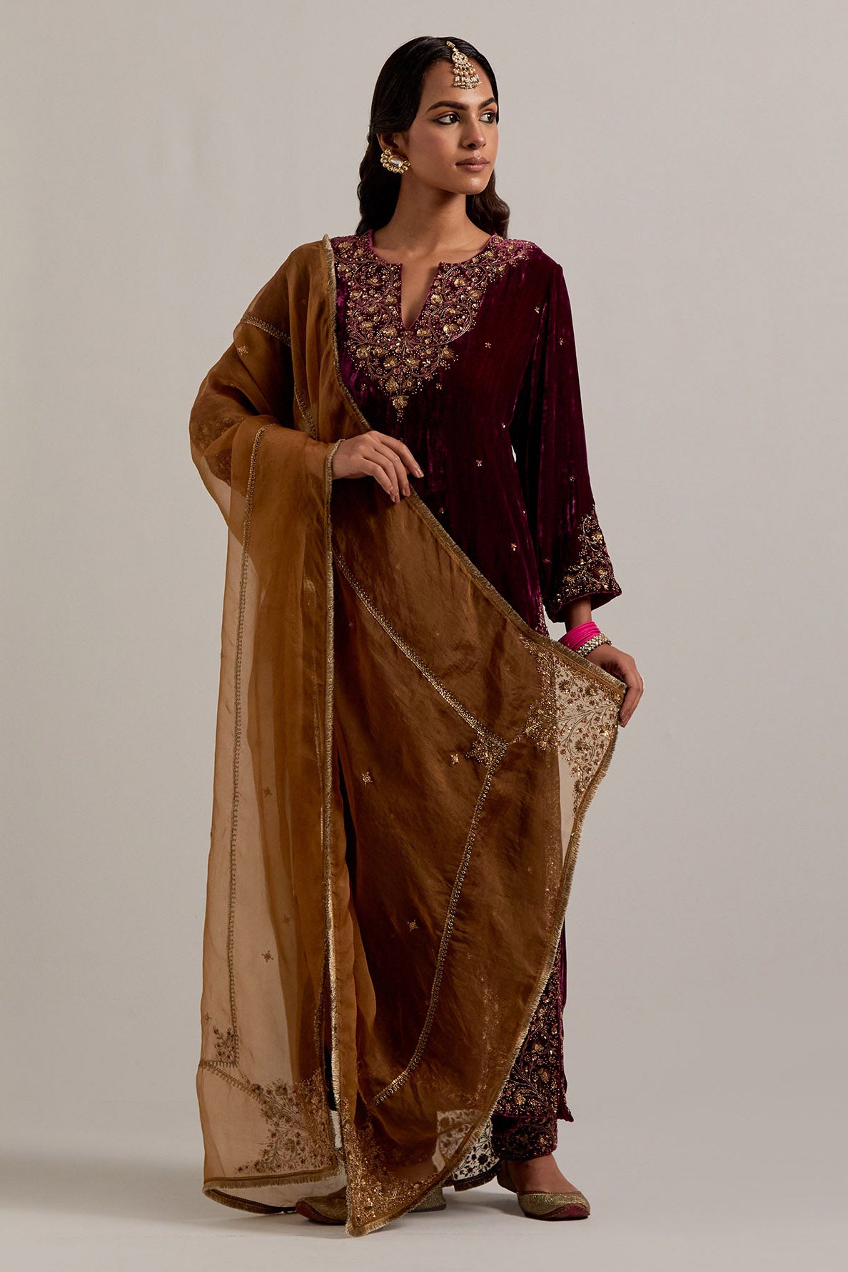 Plum straight Silk Velvet kurta set with all-over hand-embroidered bead, sequins, zardozi and zari work.