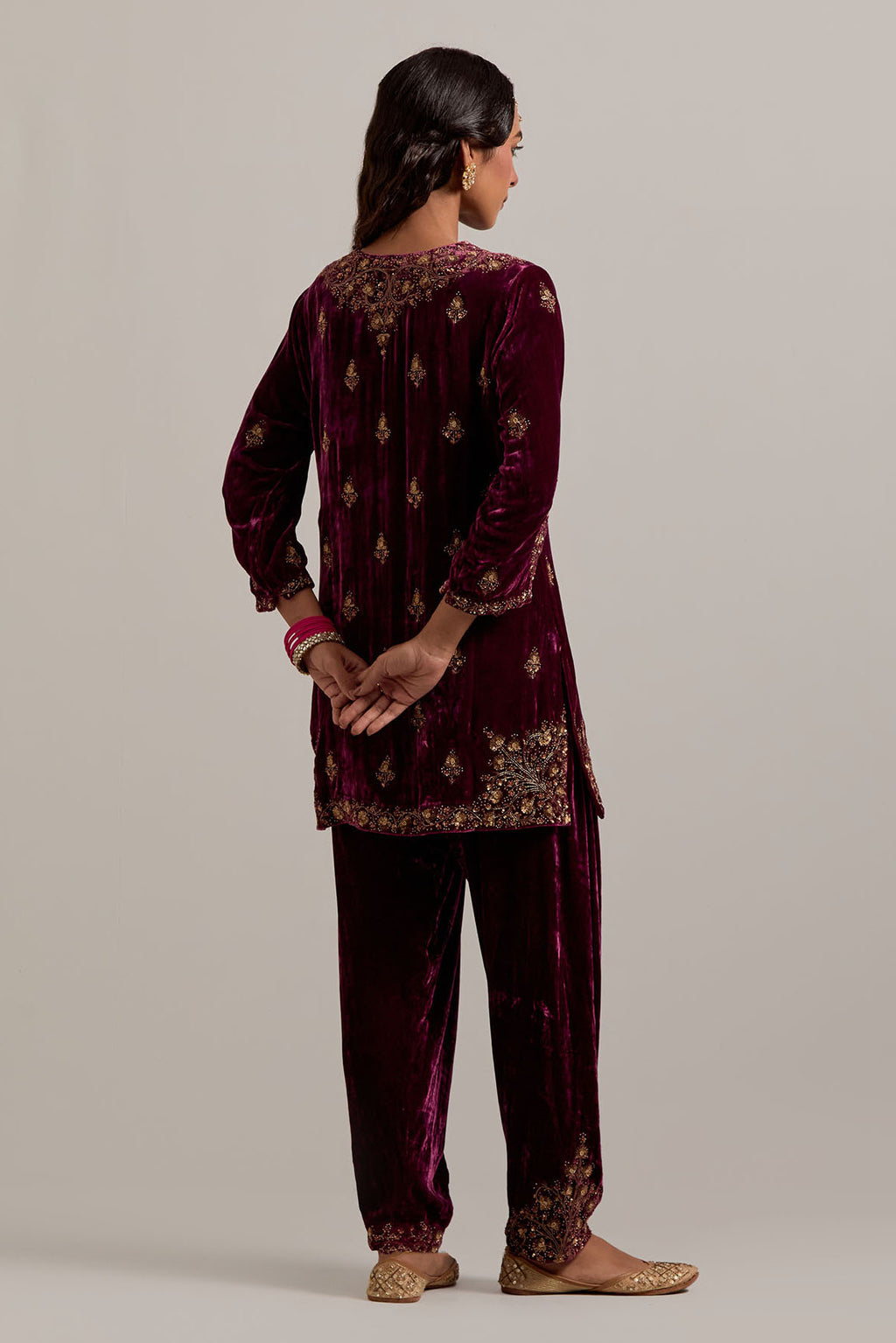 Plum straight Silk Velvet short kurta set with all-over hand-embroidered bead, sequins, zardozi and zari work.
