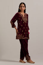 Plum straight Silk Velvet short kurta set with all-over hand-embroidered bead, sequins, zardozi and zari work.