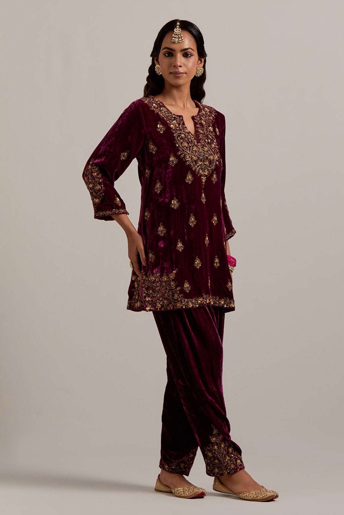 Plum straight Silk Velvet short kurta set with all-over hand-embroidered bead, sequins, zardozi and zari work.