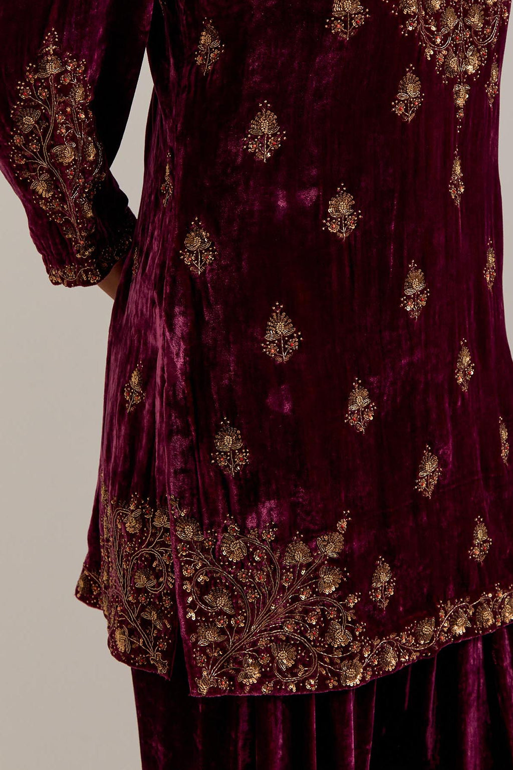 Plum straight Silk Velvet short kurta set with all-over hand-embroidered bead, sequins, zardozi and zari work.