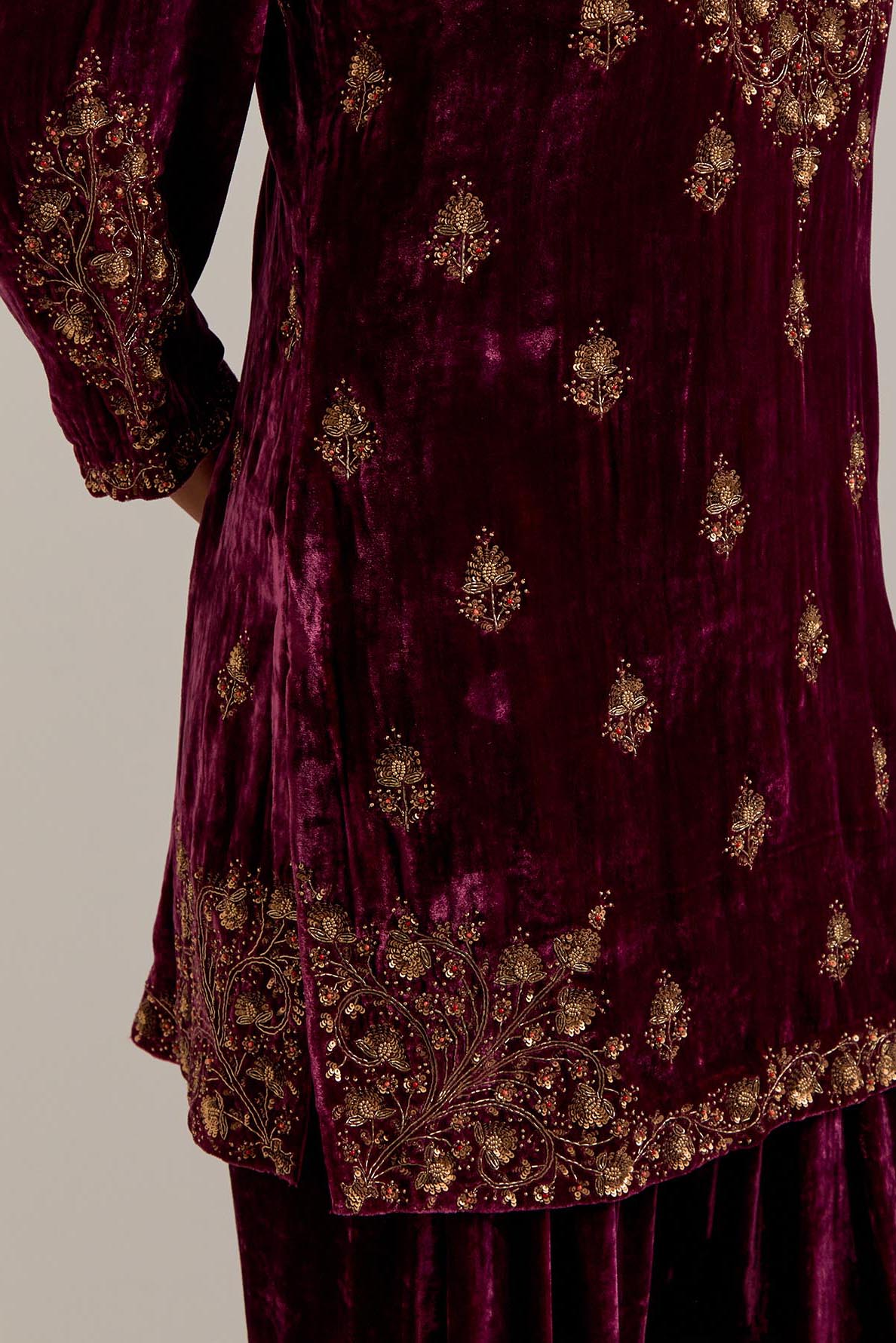Plum straight Silk Velvet short kurta set with all-over hand-embroidered bead, sequins, zardozi and zari work.
