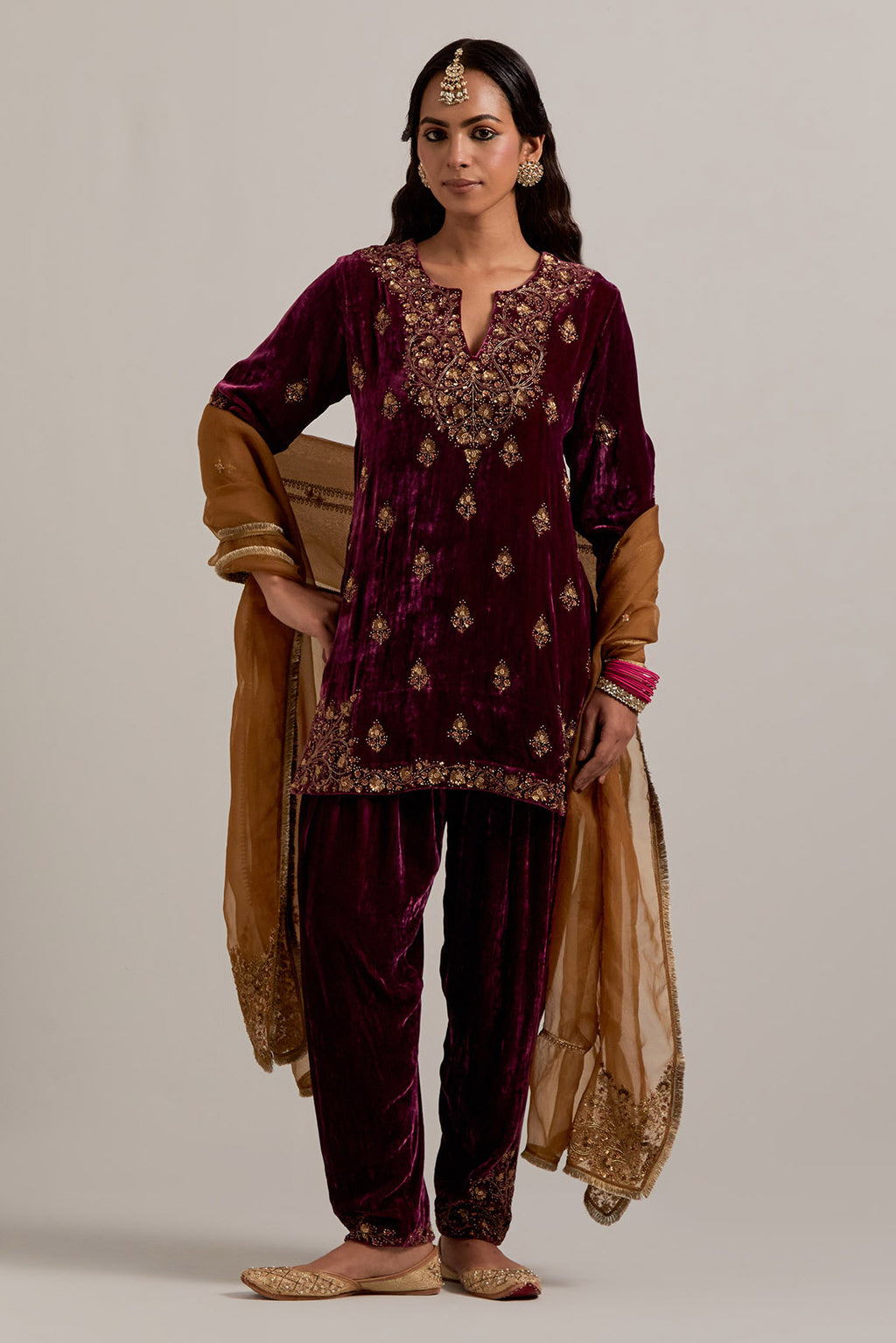 Plum straight Silk Velvet short kurta set with all-over hand-embroidered bead, sequins, zardozi and zari work.