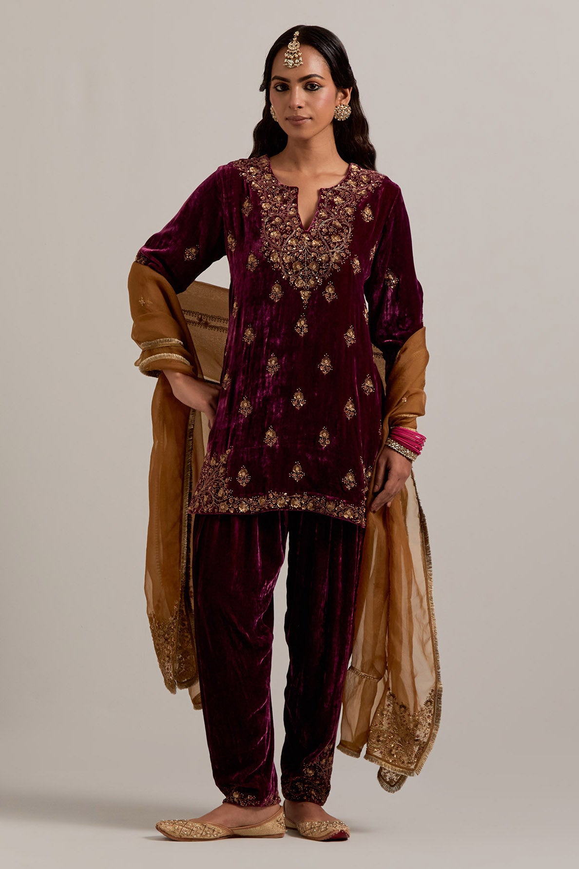 Plum straight Silk Velvet short kurta set with all-over hand-embroidered bead, sequins, zardozi and zari work.