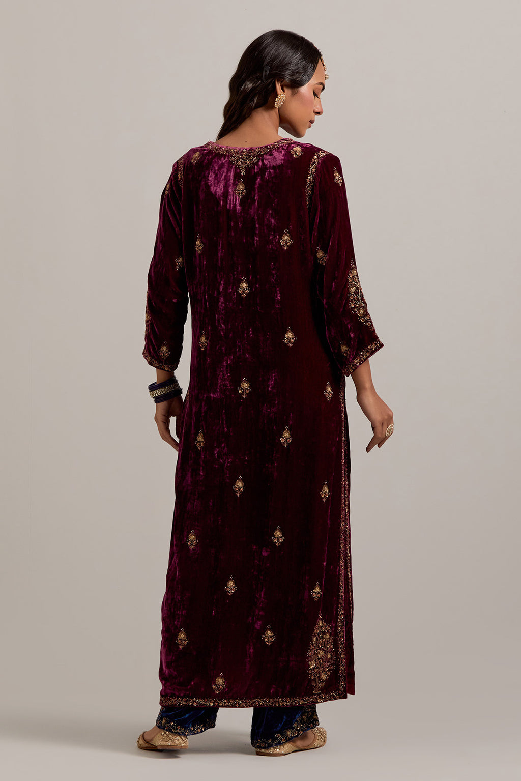 Plum straight Silk Velvet kurta set with all-over hand-embroidered small floral booti with sequins, zardozi, bead and zari work.