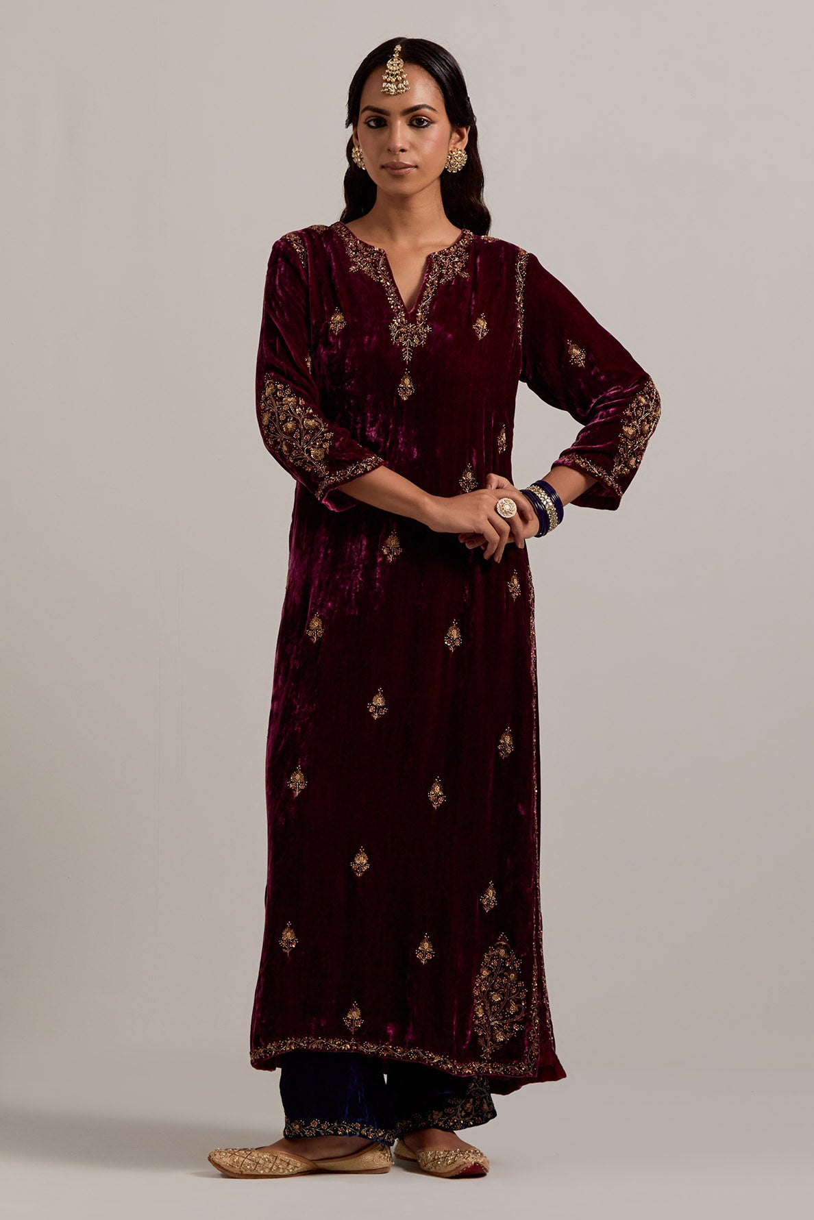 Plum straight Silk Velvet kurta set with all-over hand-embroidered small floral booti with sequins, zardozi, bead and zari work.