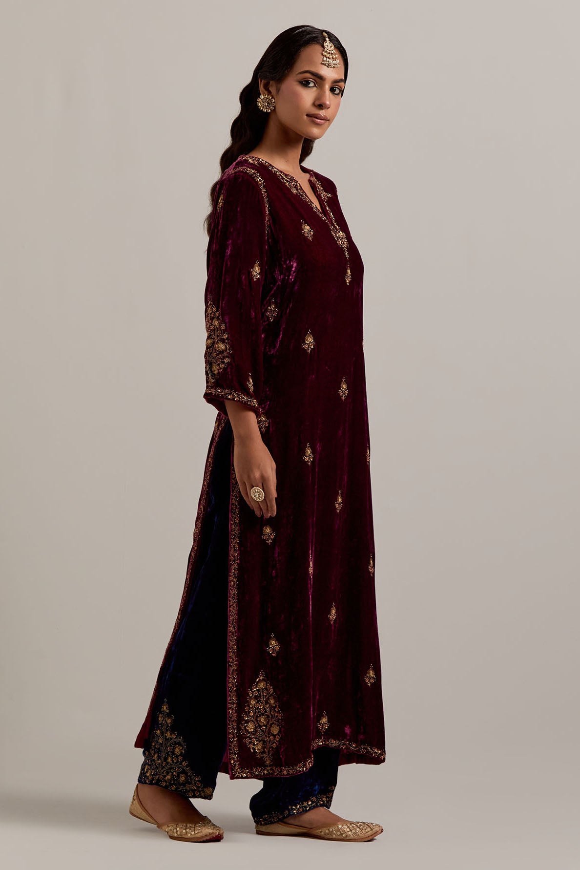Plum straight Silk Velvet kurta set with all-over hand-embroidered small floral booti with sequins, zardozi, bead and zari work.