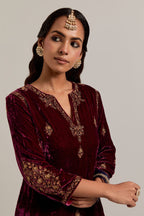 Plum straight Silk Velvet kurta set with all-over hand-embroidered small floral booti with sequins, zardozi, bead and zari work.