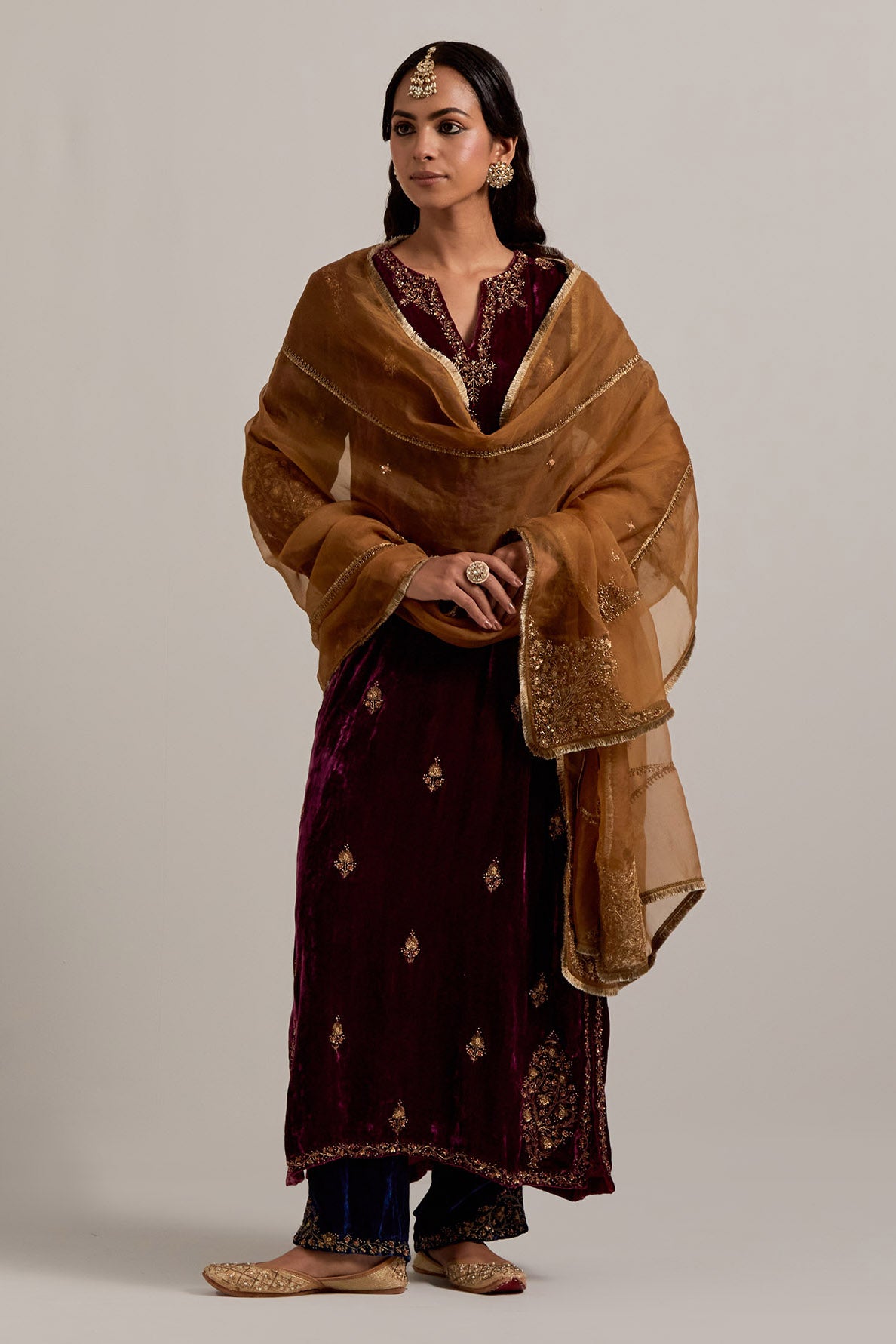 Plum straight Silk Velvet kurta set with all-over hand-embroidered small floral booti with sequins, zardozi, bead and zari work.
