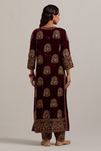 Plum silk velvet straight kurta set with sequins, zardozi, zari embroidered peacock boota all-over the kurta, highlighted with contrast bead work.