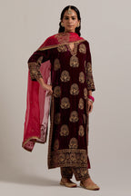 Plum silk velvet straight kurta set with sequins, zardozi, zari embroidered peacock boota all-over the kurta, highlighted with contrast bead work.