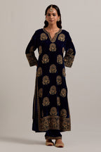 Navy blue silk velvet straight kurta set with sequins, zardozi, zari embroidered peacock boota all-over the kurta, highlighted with contrast bead work.