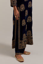 Navy blue silk velvet straight kurta set with sequins, zardozi, zari embroidered peacock boota all-over the kurta, highlighted with contrast bead work.
