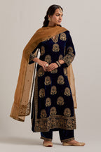 Navy blue silk velvet straight kurta set with sequins, zardozi, zari embroidered peacock boota all-over the kurta, highlighted with contrast bead work.